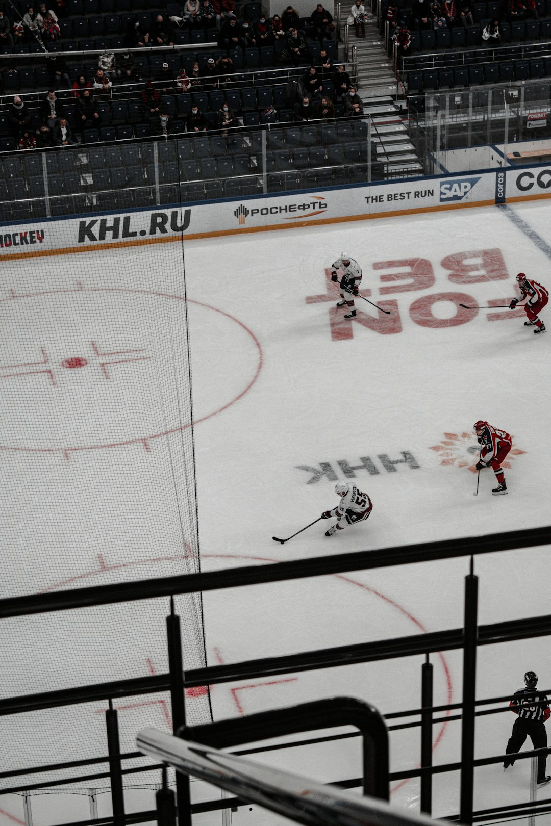 ice hockey players on ice hockey field