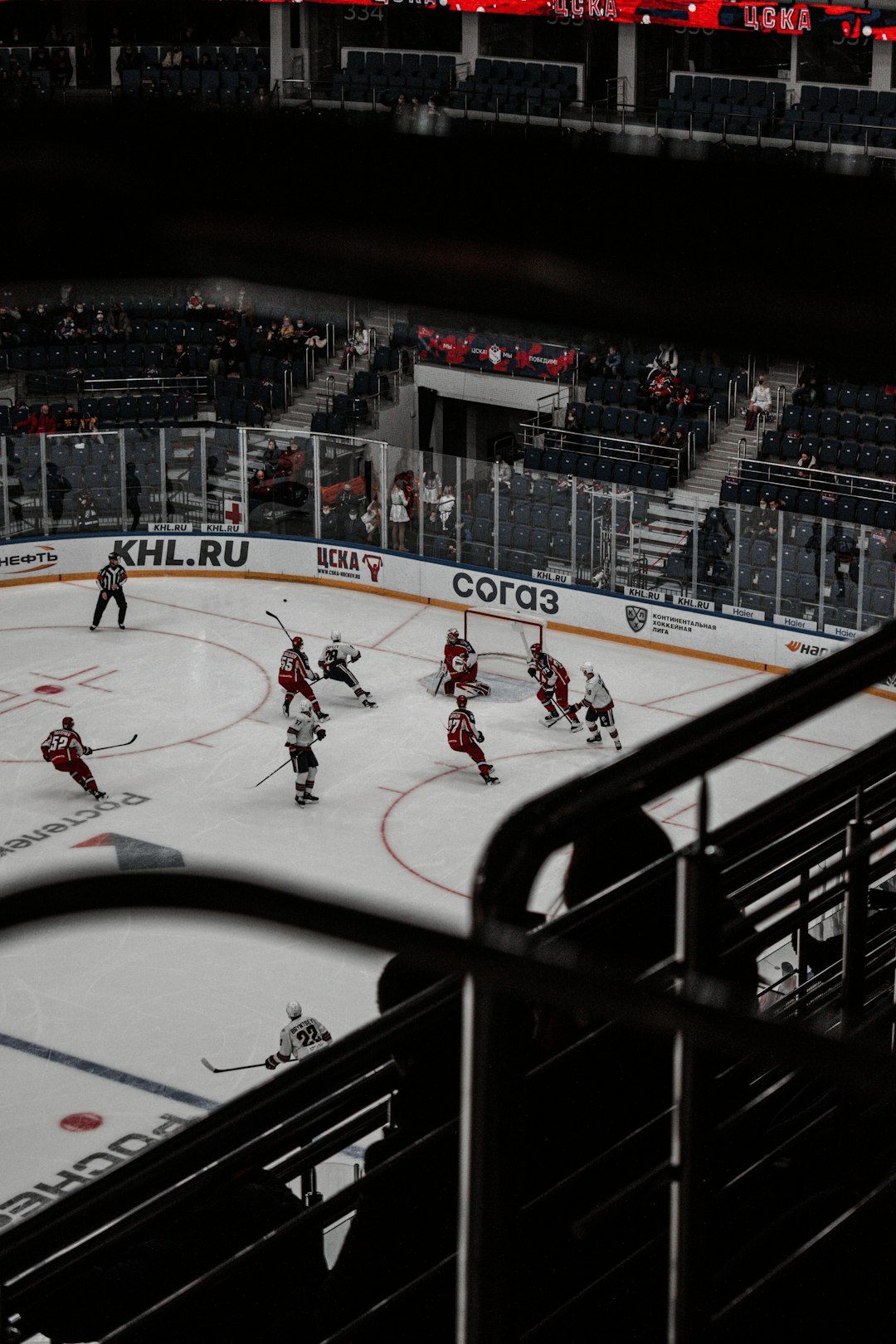 people playing ice hockey on ice stadium