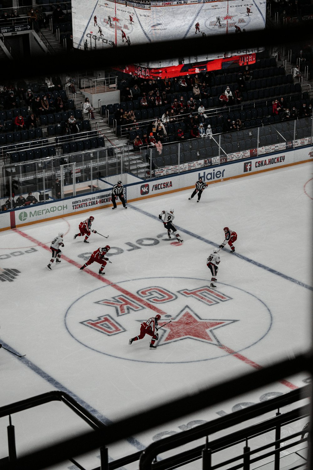 ice hockey players on ice hockey stadium