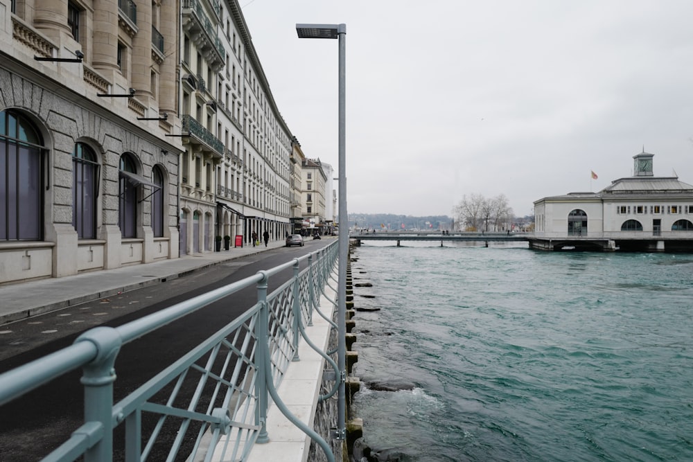 body of water between buildings during daytime