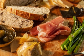 sliced meat on brown wooden chopping board
