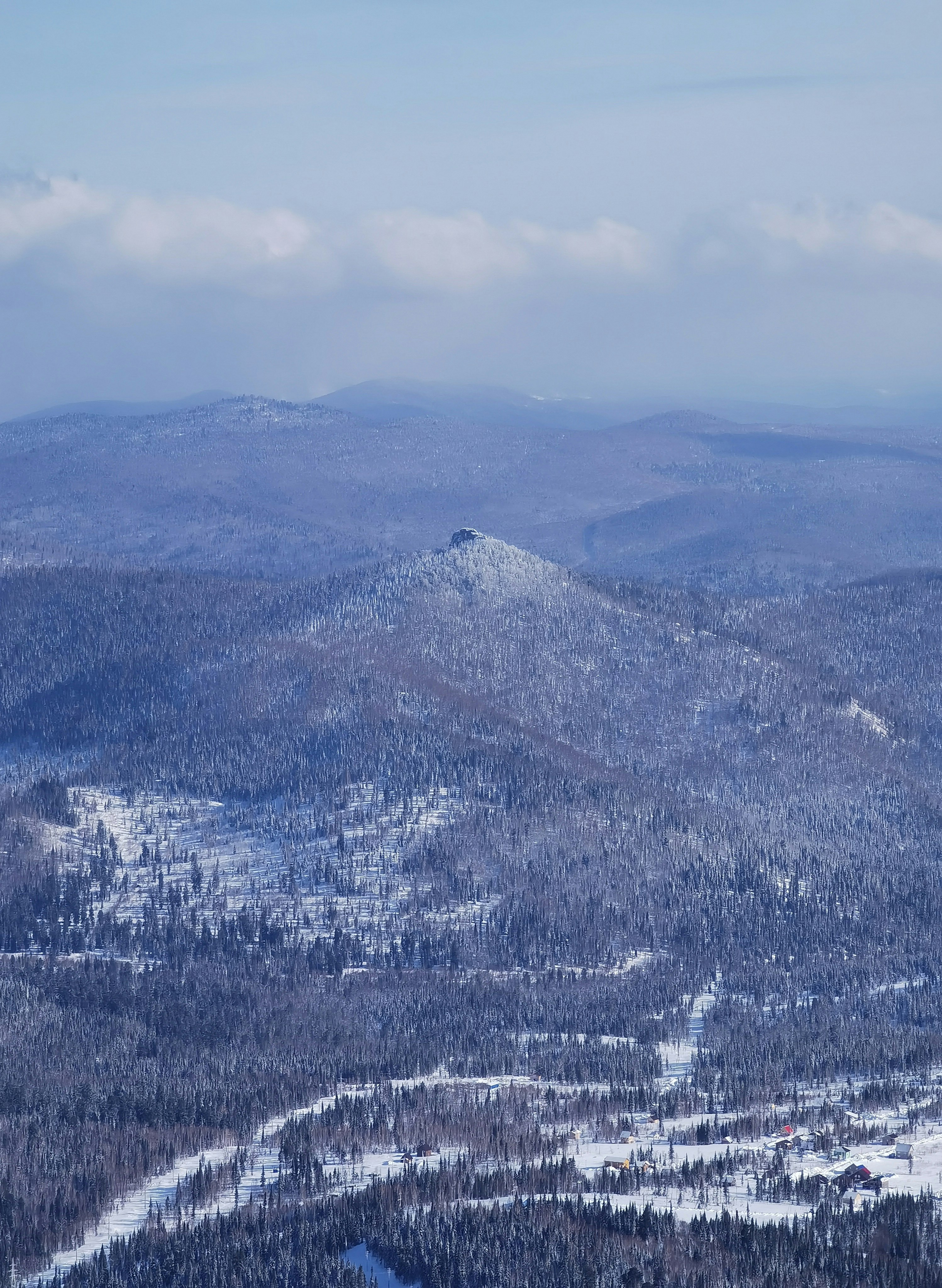 aerial view of snow covered mountain during daytime