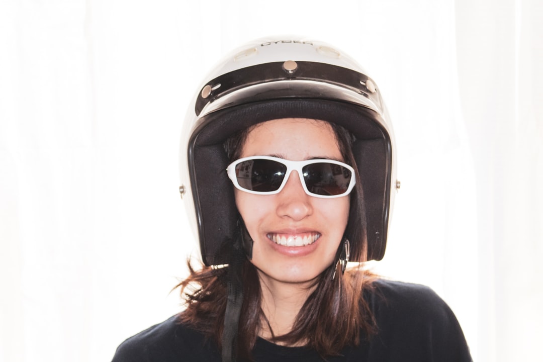 woman in black shirt wearing black helmet