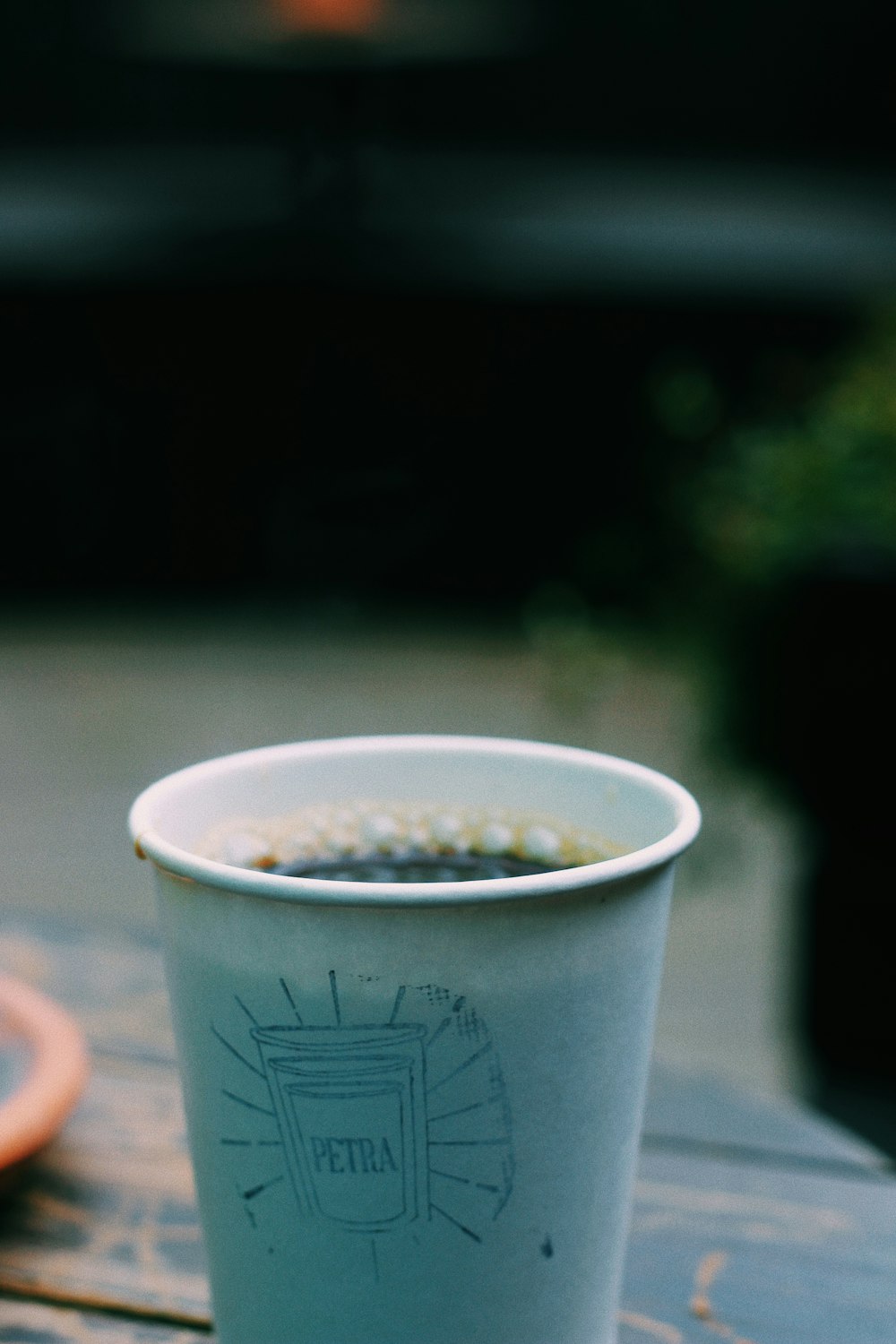 blue and white paper cup