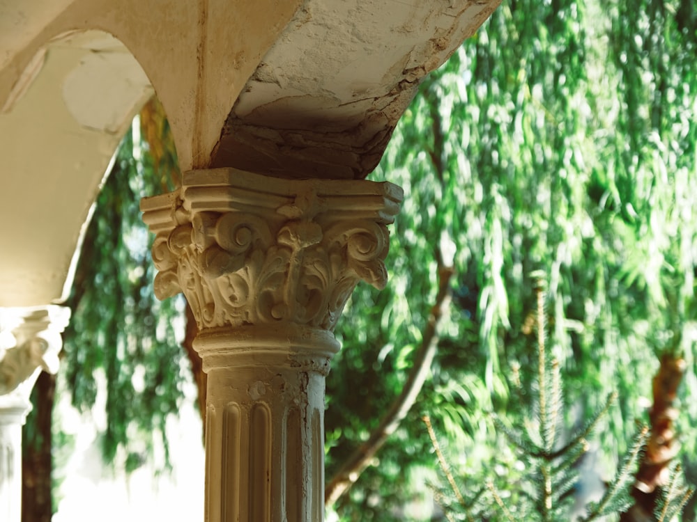 brown concrete post during daytime