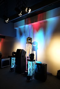 black and gray speakers on black table