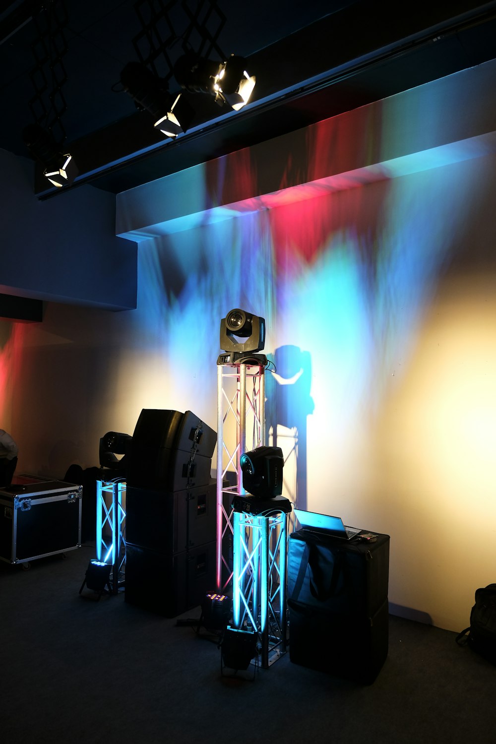 black and gray speakers on black table