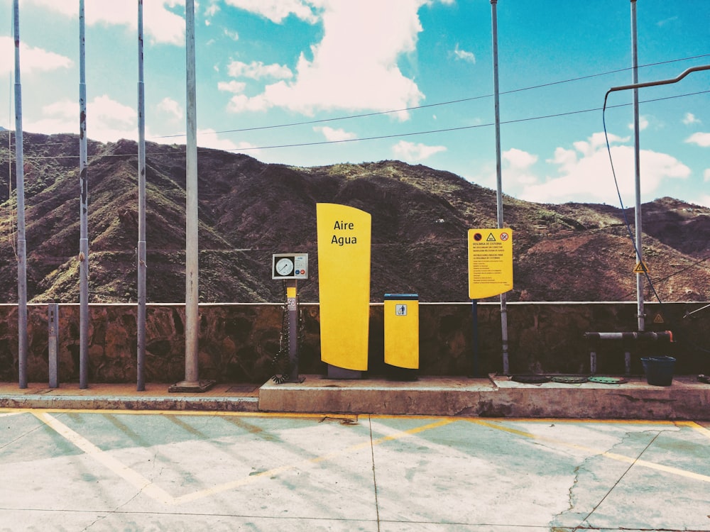 yellow and black caution sign