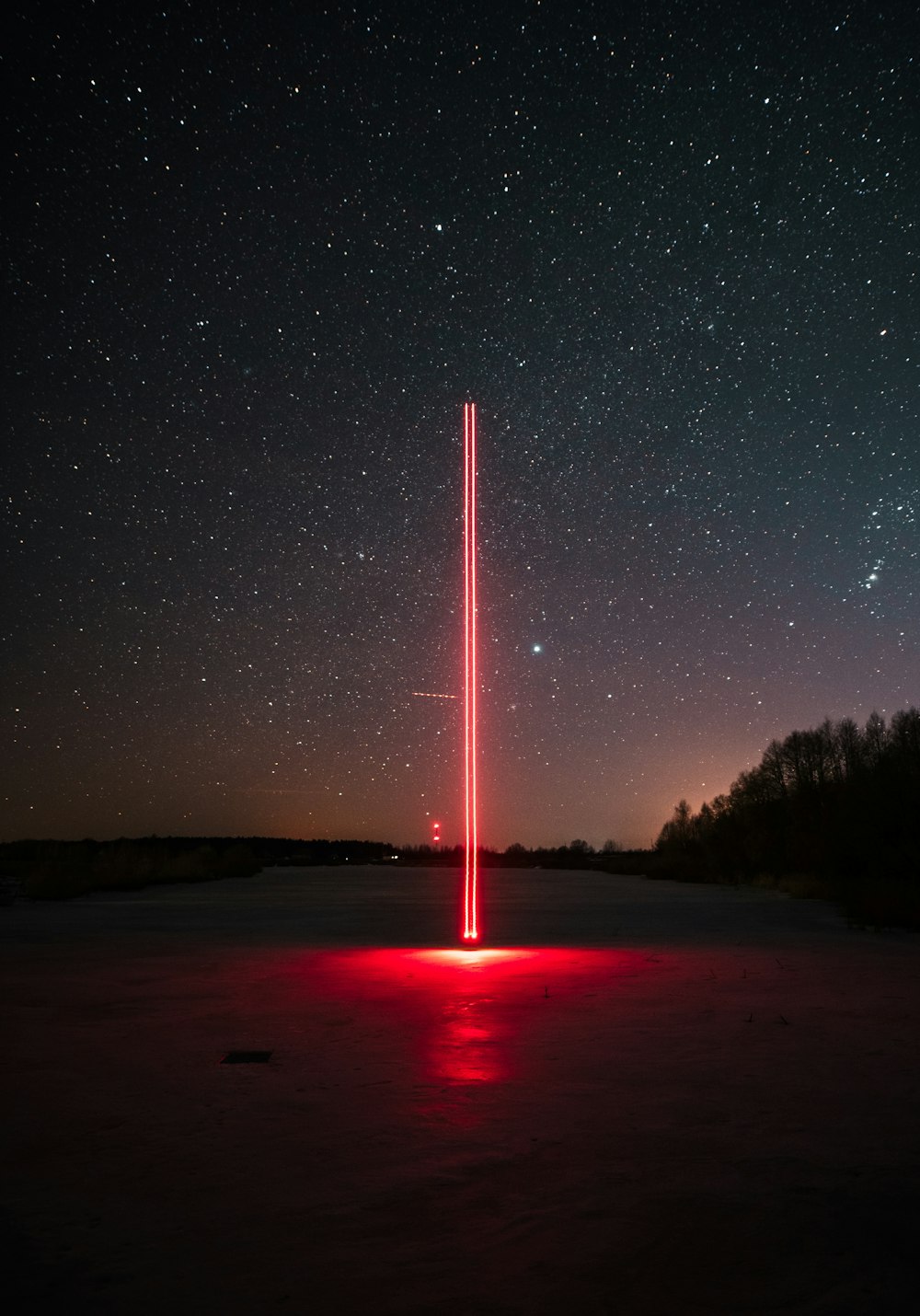 white and red light post during night time