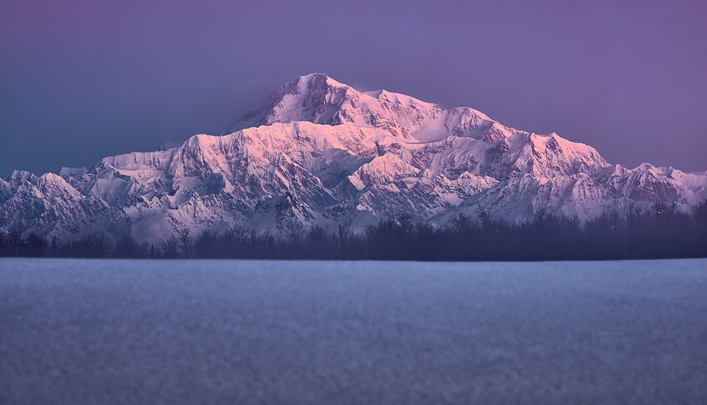 snow covered mountain during daytime