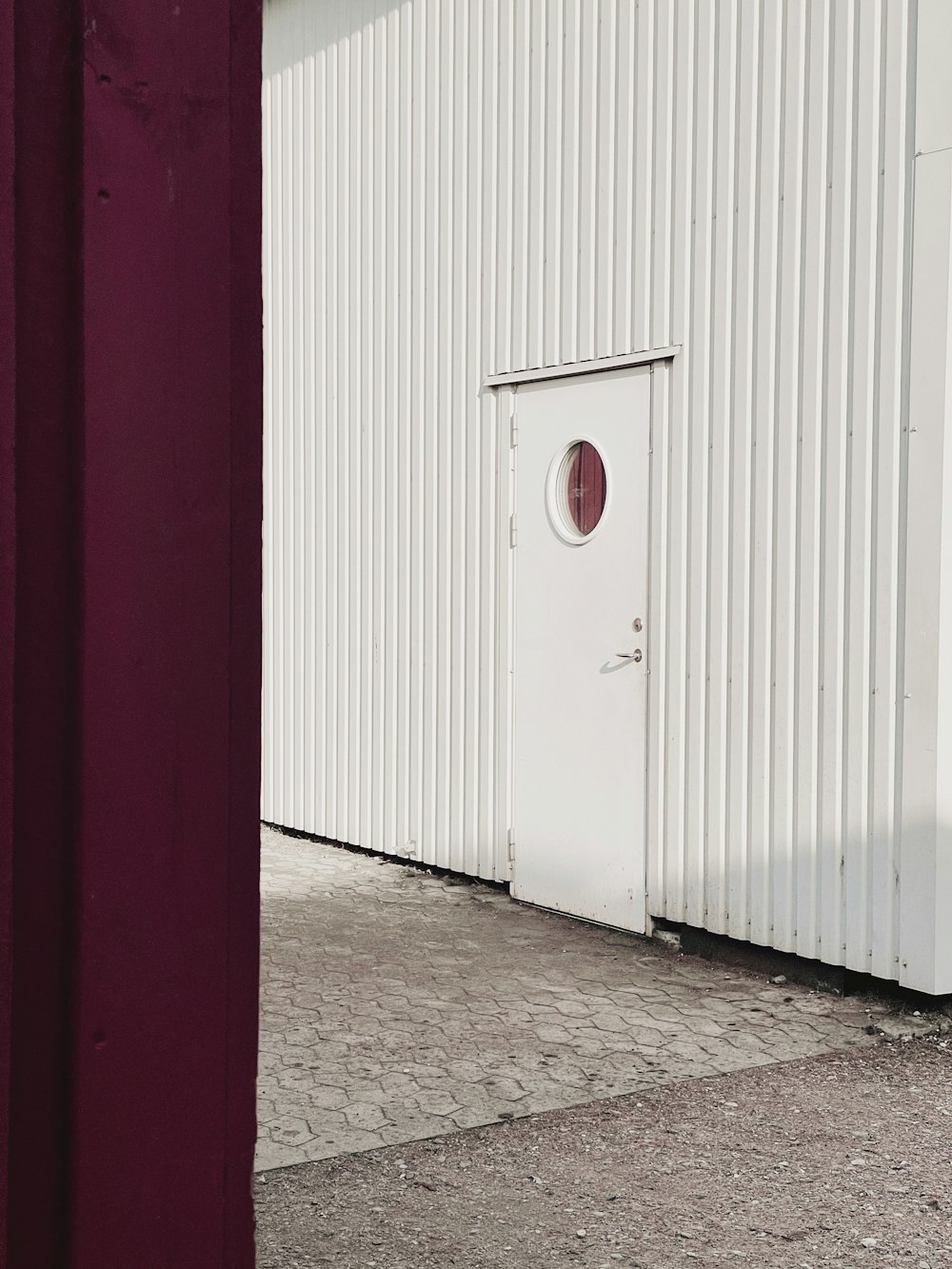 red and white door with white door