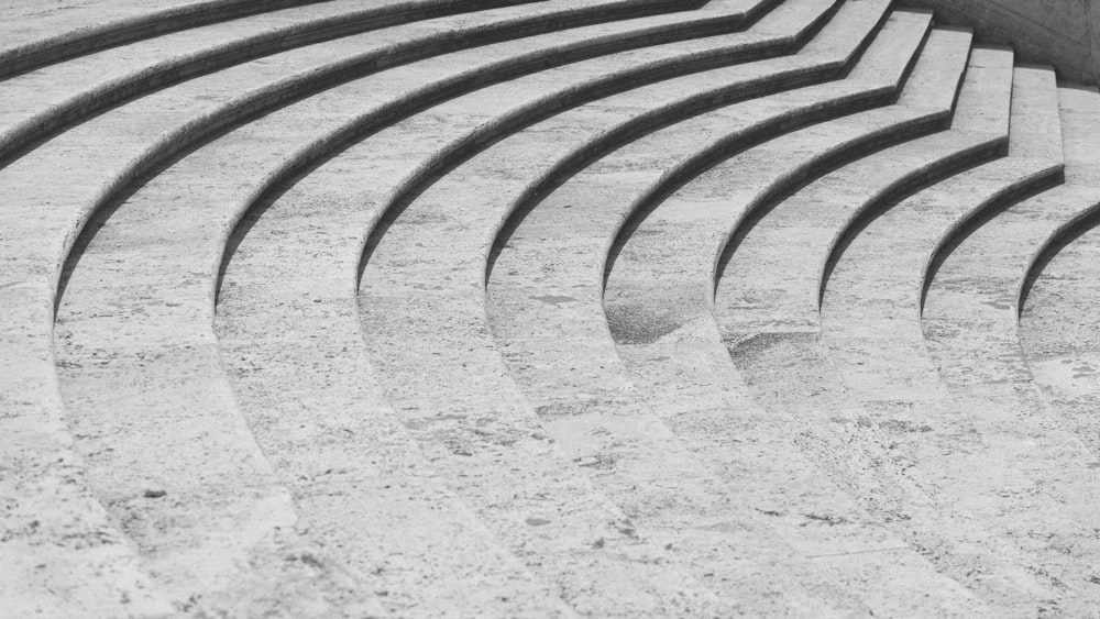 black metal fence on white sand