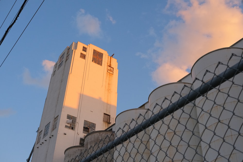 white concrete building under blue sky during daytime