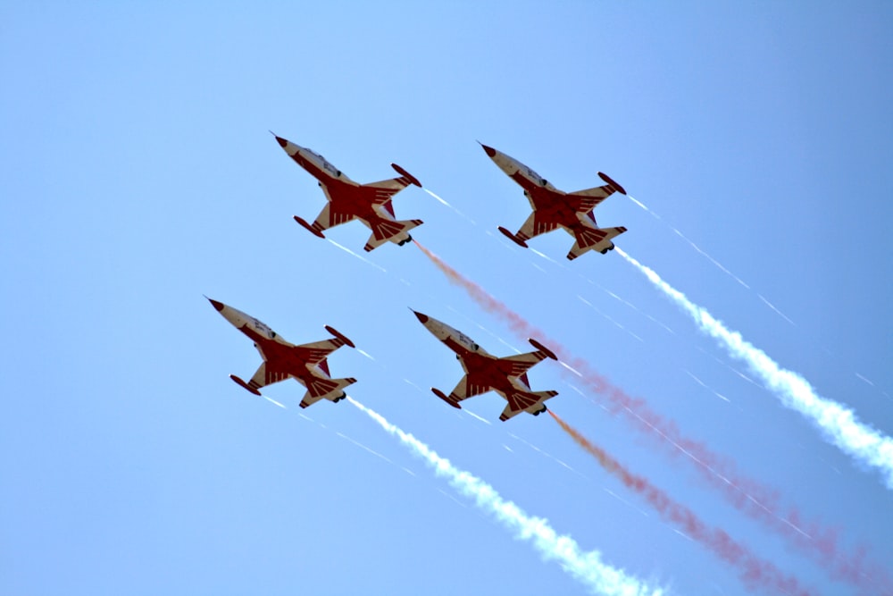 four fighter planes in mid air