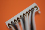 Professional photo of electrical wiring harnesses with connectors, highlighting quality craftsmanship.