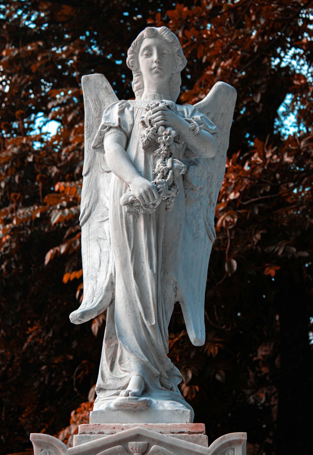 angel statue in close up photography
