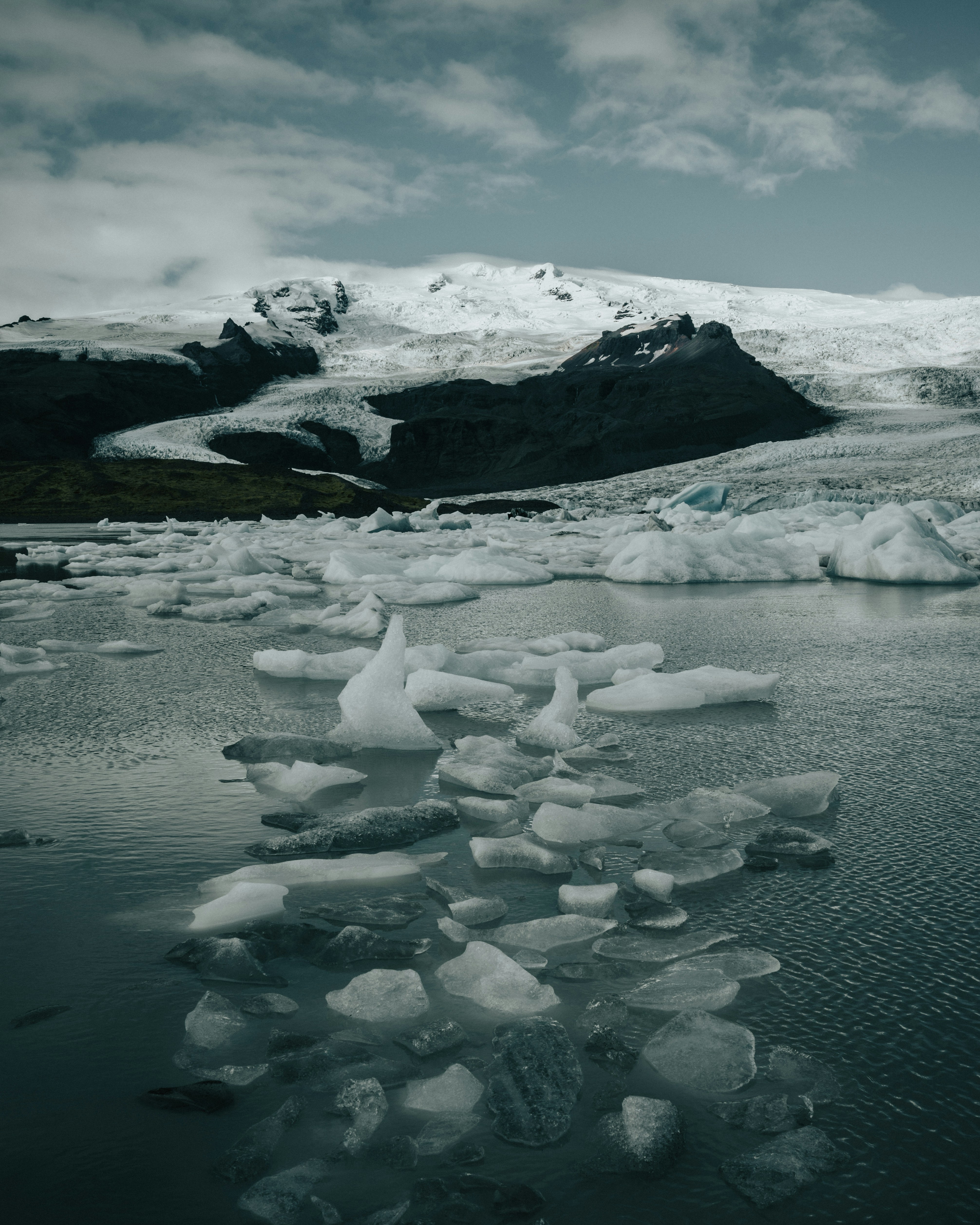 ice blocks on body of water