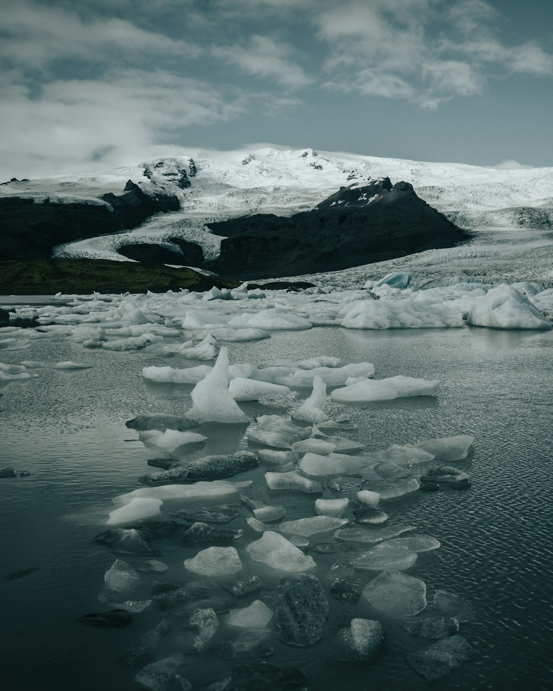 ice blocks on body of water