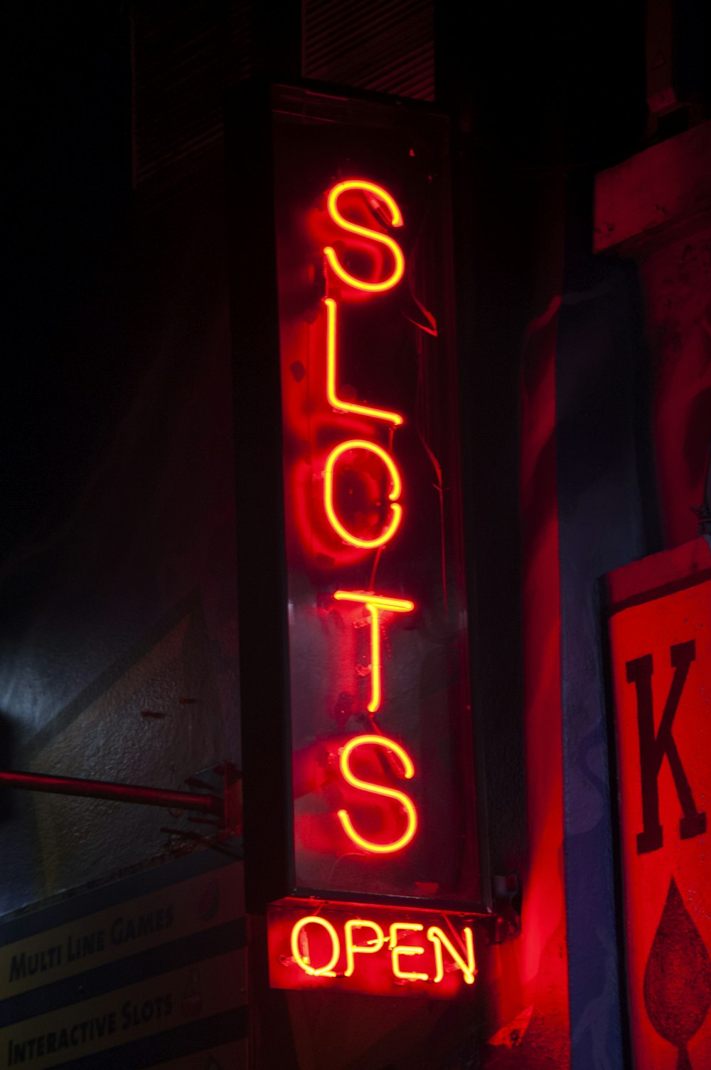 red and white love neon light signage