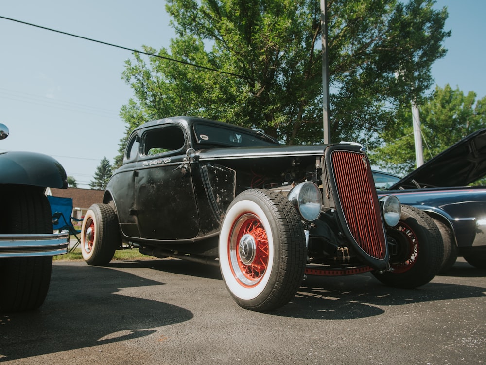 black vintage car on road during daytime