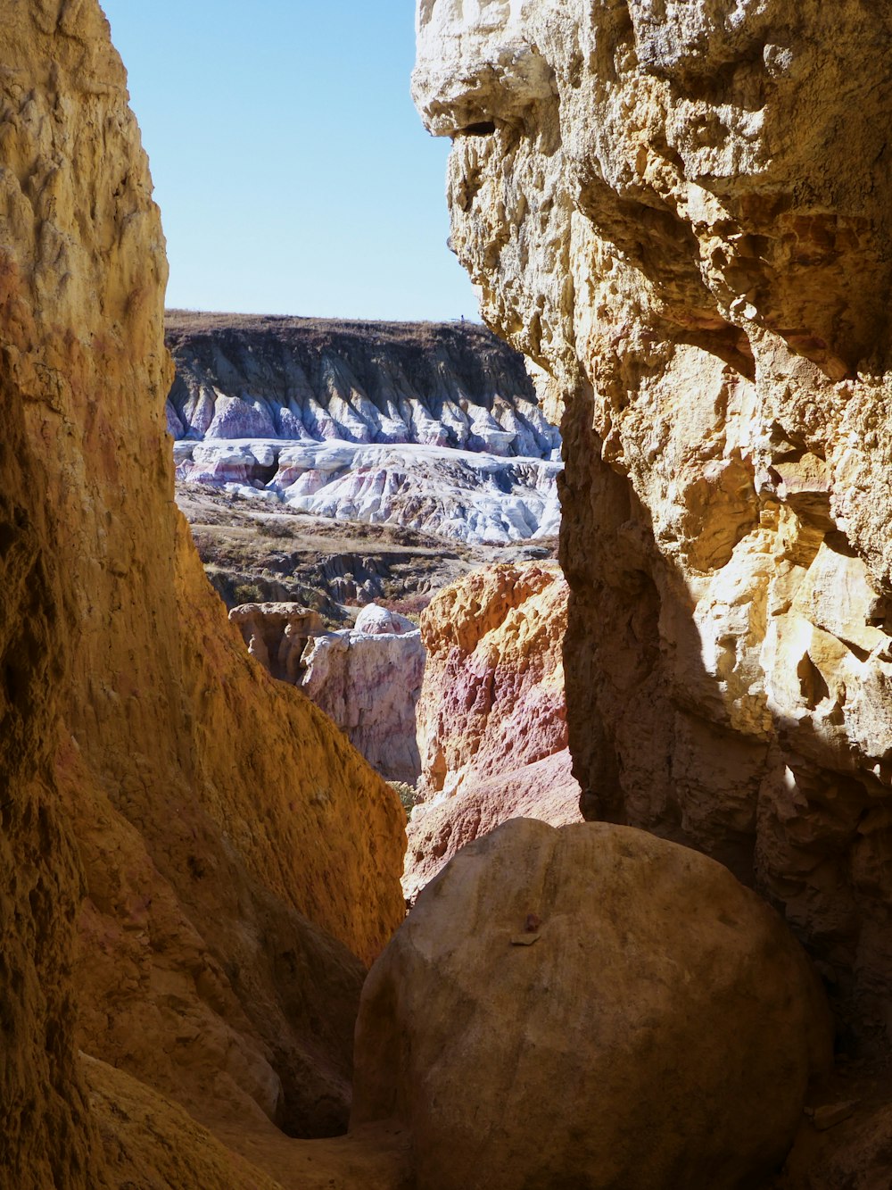 brown rocky mountain with waterfalls during daytime