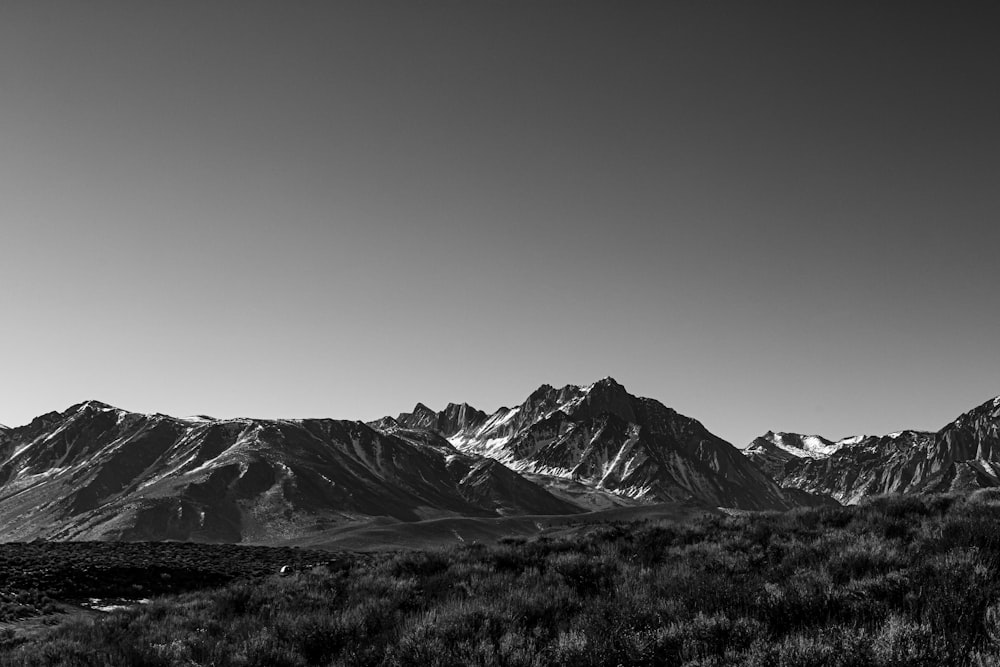 grayscale photo of snow covered mountain