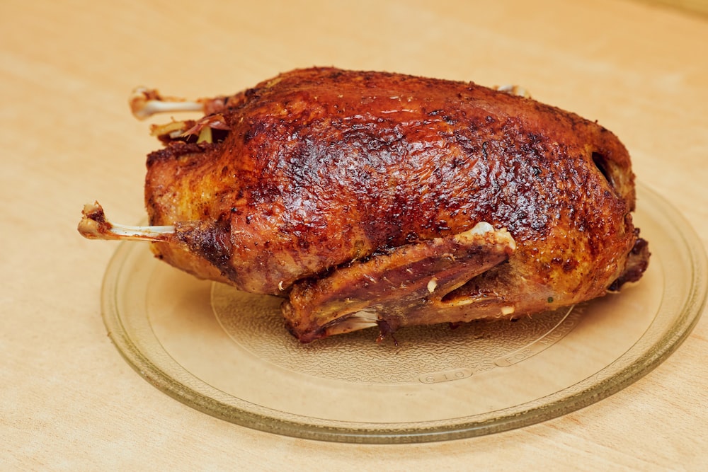 roasted chicken on white ceramic plate