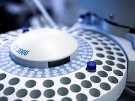 white and black round electronic device
