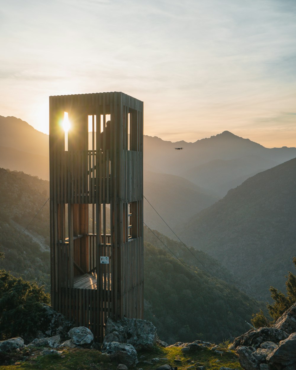 brown building on top of mountain during daytime