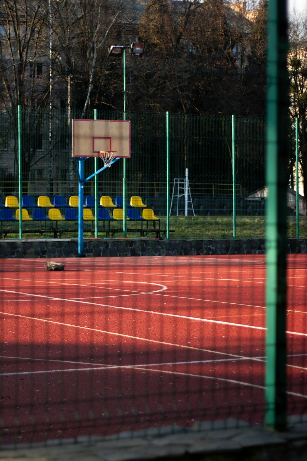 blue and yellow soccer goal net