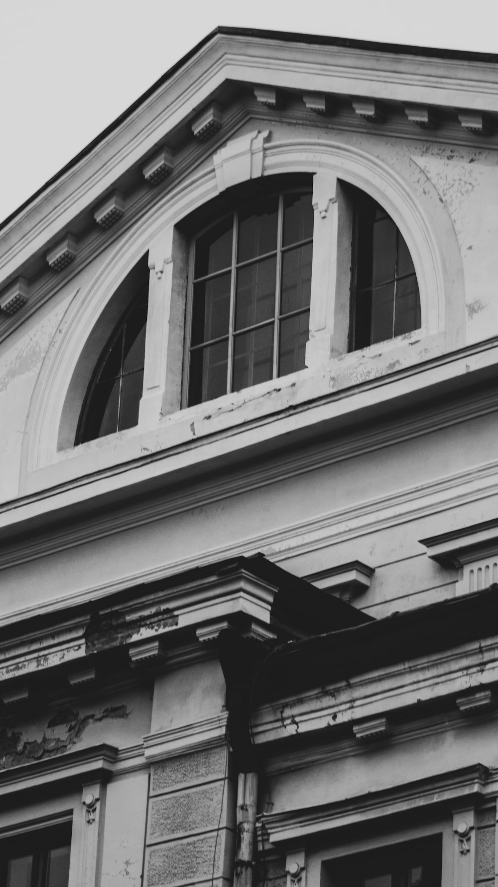 grayscale photo of concrete building