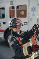 woman firefighter wearing helmet