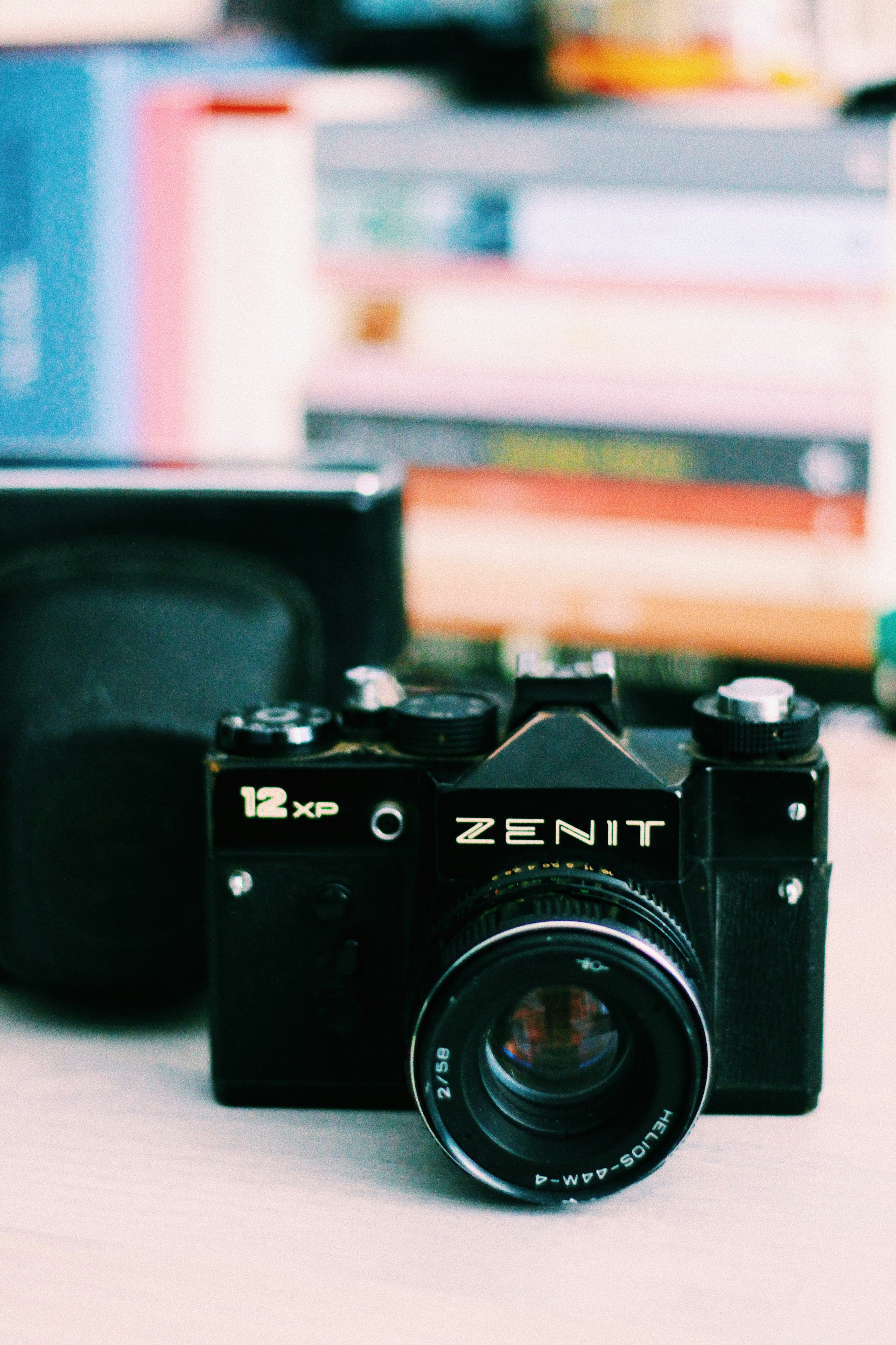 black and silver nikon dslr camera