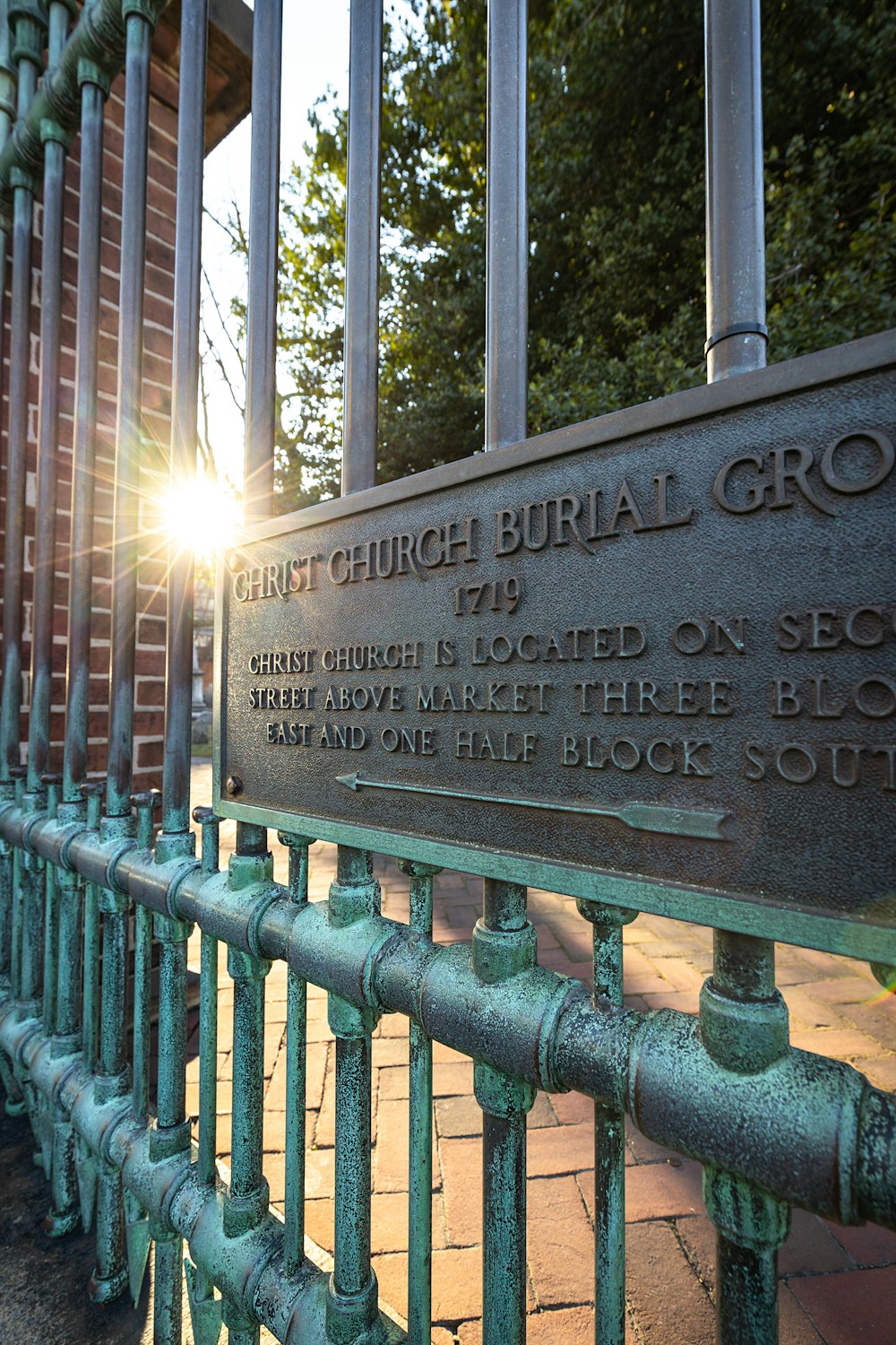 black metal fence with quote