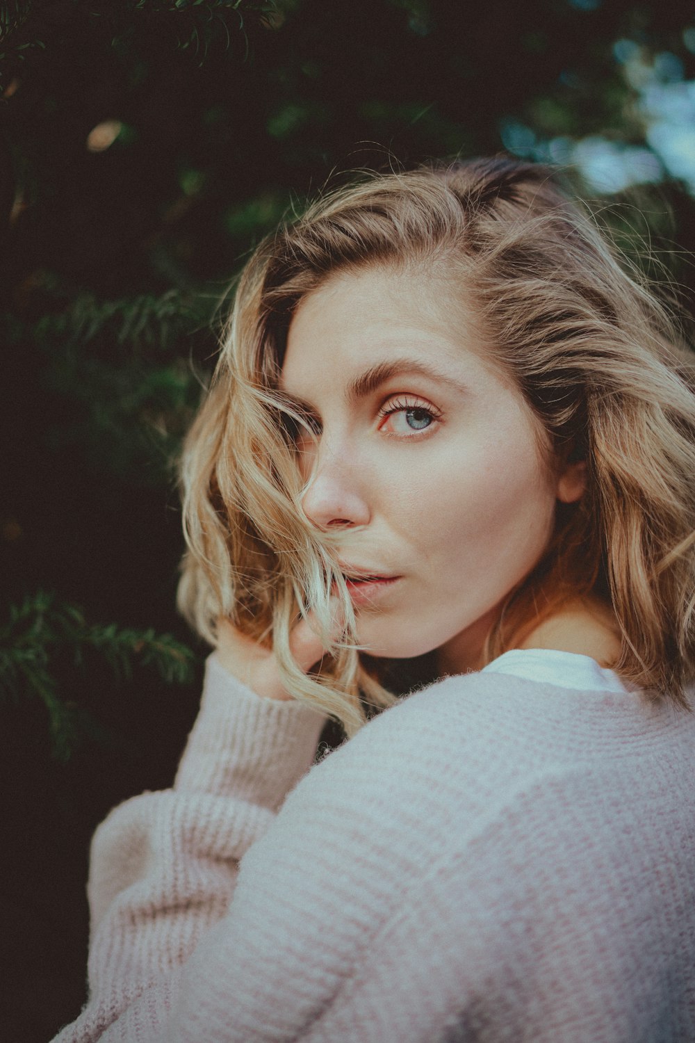 woman in white knit sweater