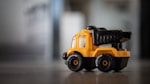 yellow and black truck toy