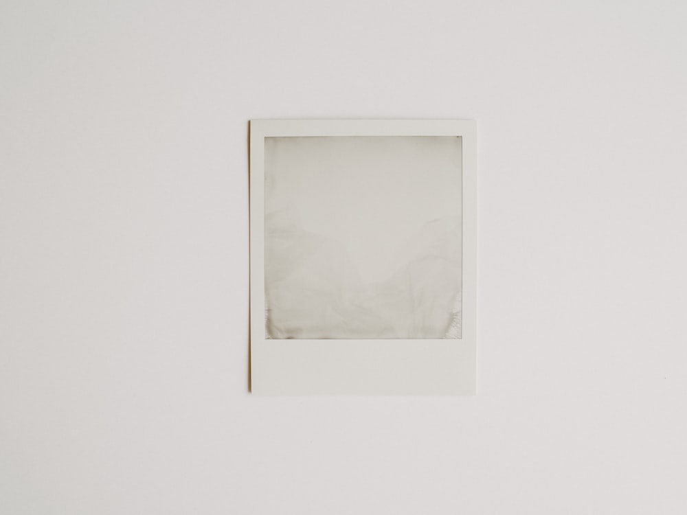 white square frame on white wall