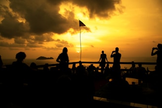 Sunset over the San Francisco Bay with a small group gathered for a traditional Tongan prayer circle.