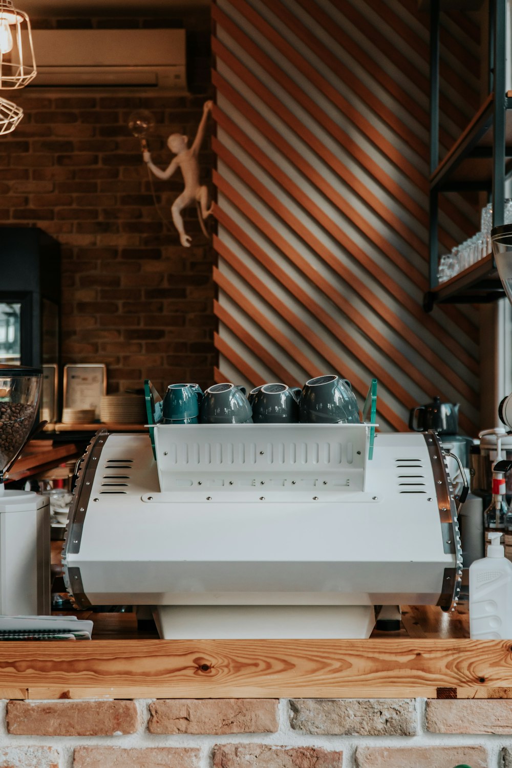 white and black printer on brown wooden table