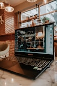 black and silver asus laptop computer
