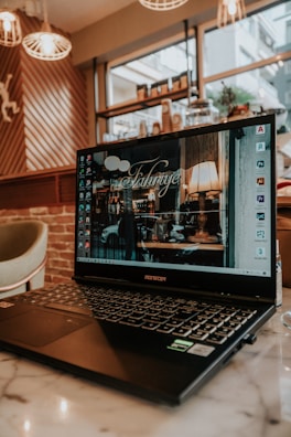 black and silver asus laptop computer