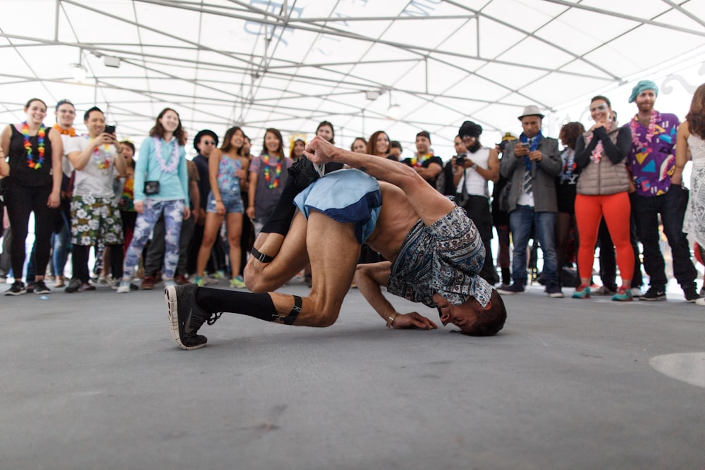 people standing on gray concrete floor during daytime