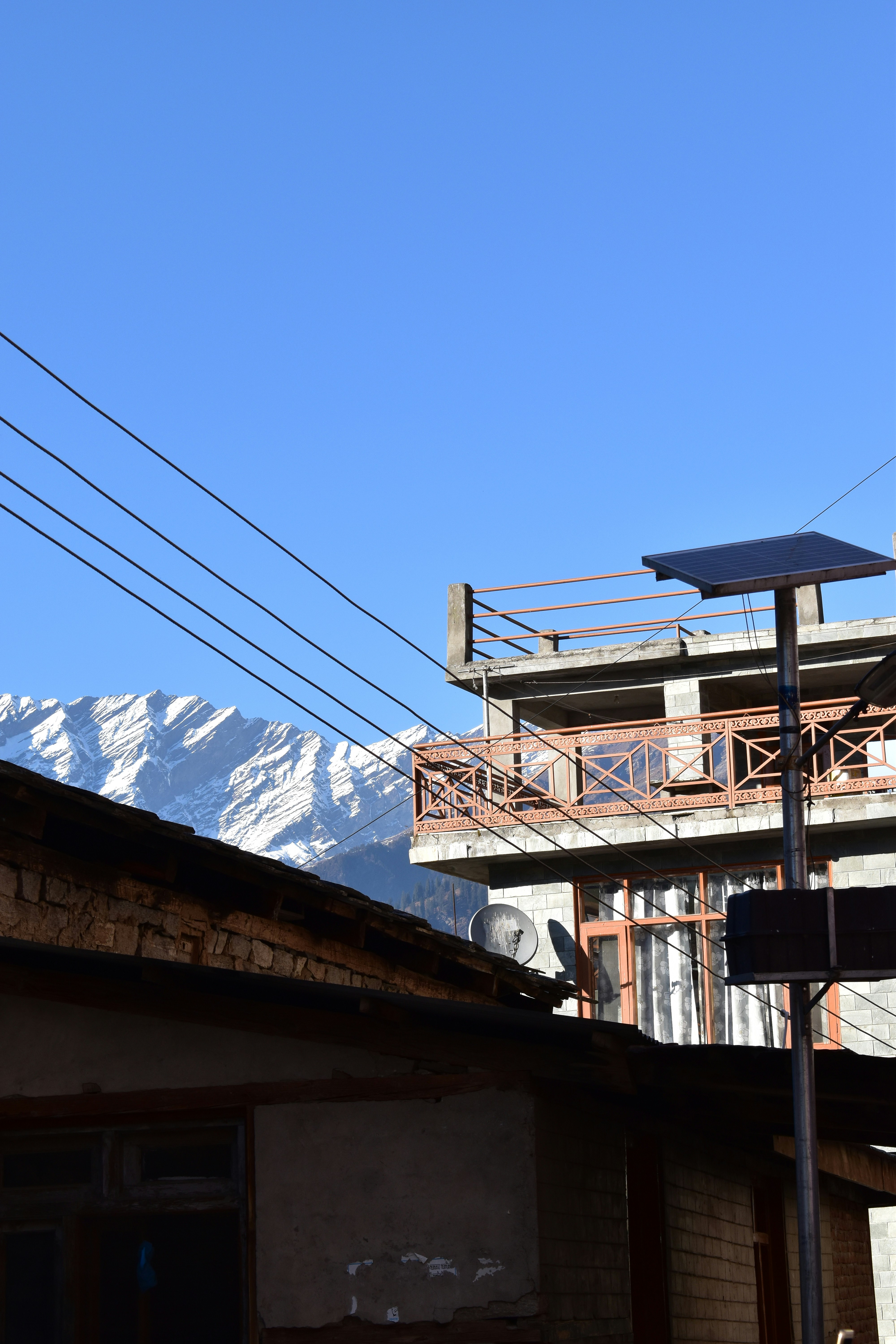 white and brown concrete building under blue sky during daytime