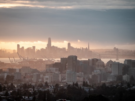 San Francisco city skyline under orange sunset