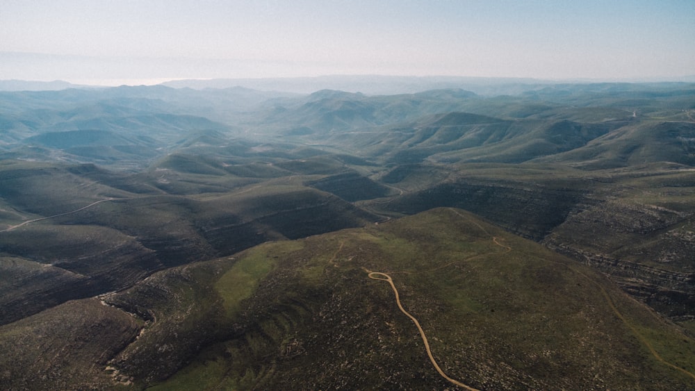 aerial view of green mountains during daytime