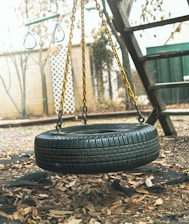 black round container on brown soil