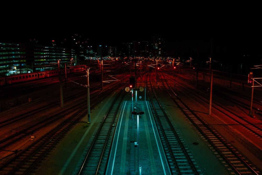 green and white road during night time