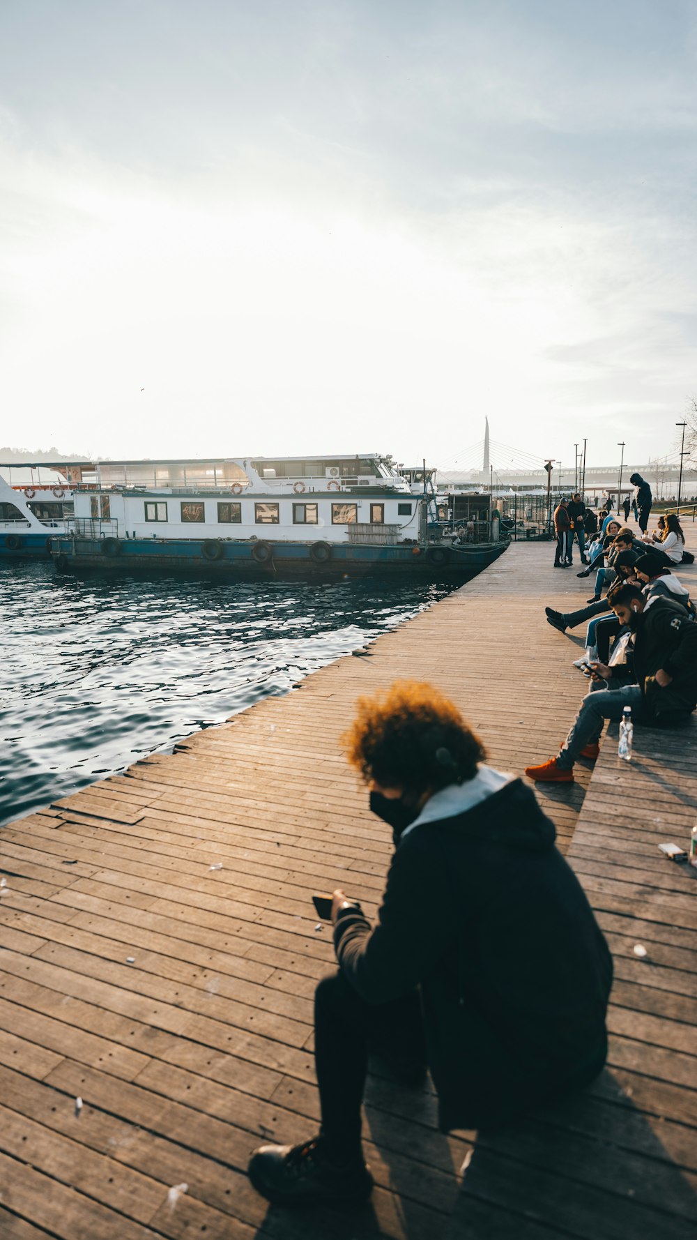 people walking on wooden dock during daytime