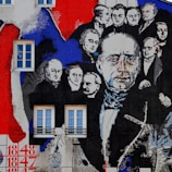 A street mural depicting historical figures related to wars and revolutions.