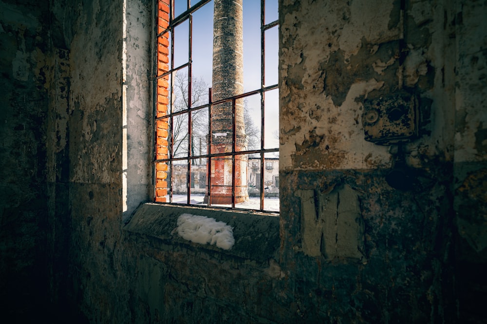 brown wooden framed glass window